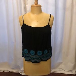 Spaghetti strap black blouse with teal detailing.